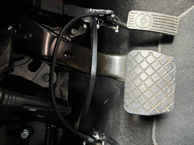 Close-up of the twin-flip left-foot accelerator fitted in a Volkswagen Polo footwell