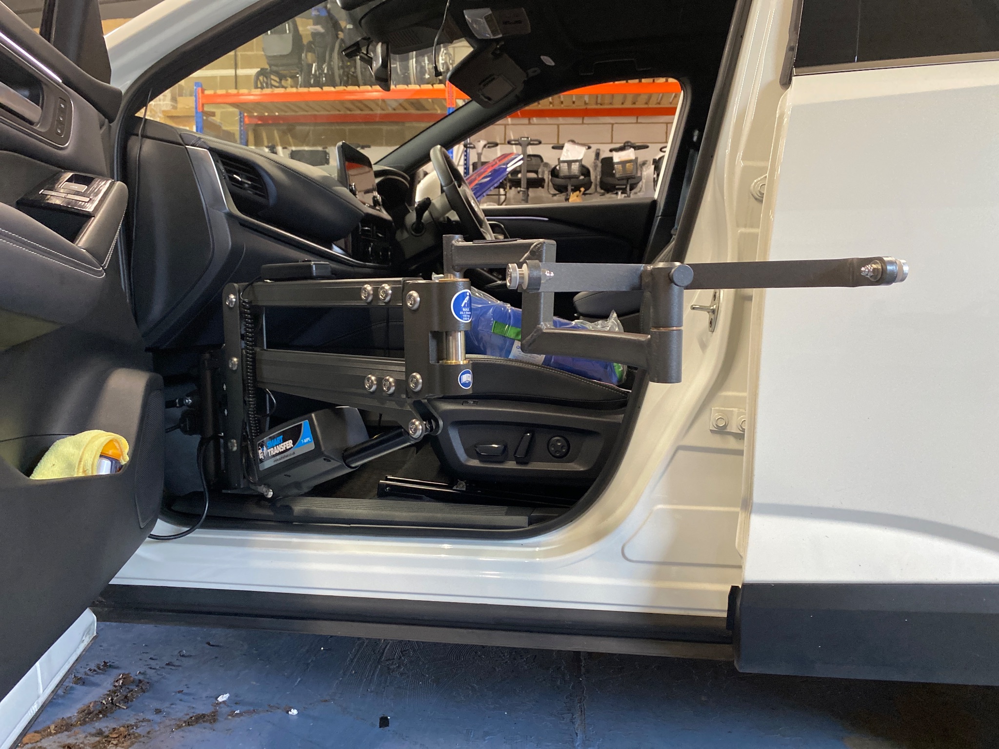 Autochair Smart Transfer person lift installed in a Nissan Qashqai