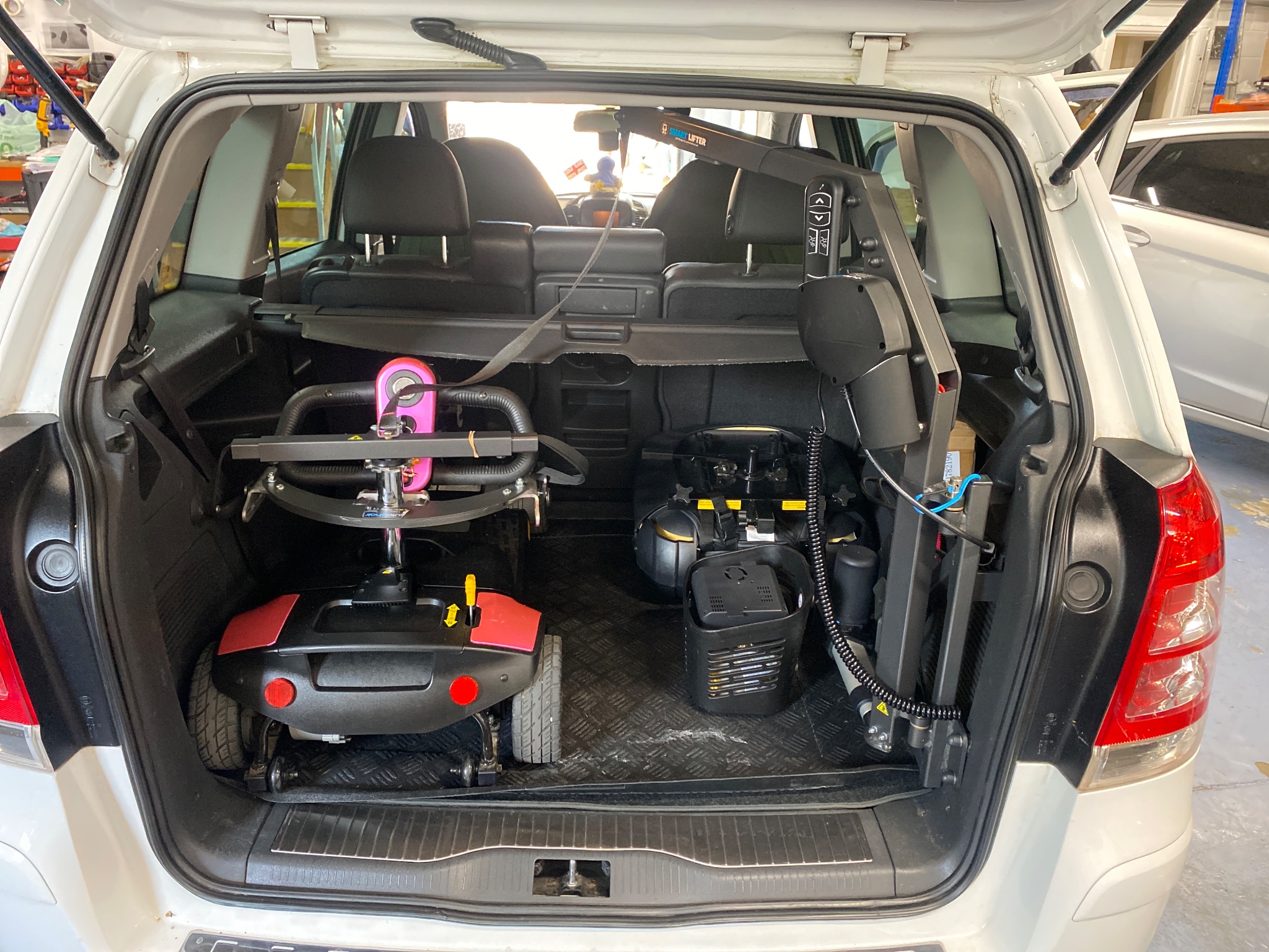Autochair 4-way boot hoist installed in the rear of a Vauxhall Zafira