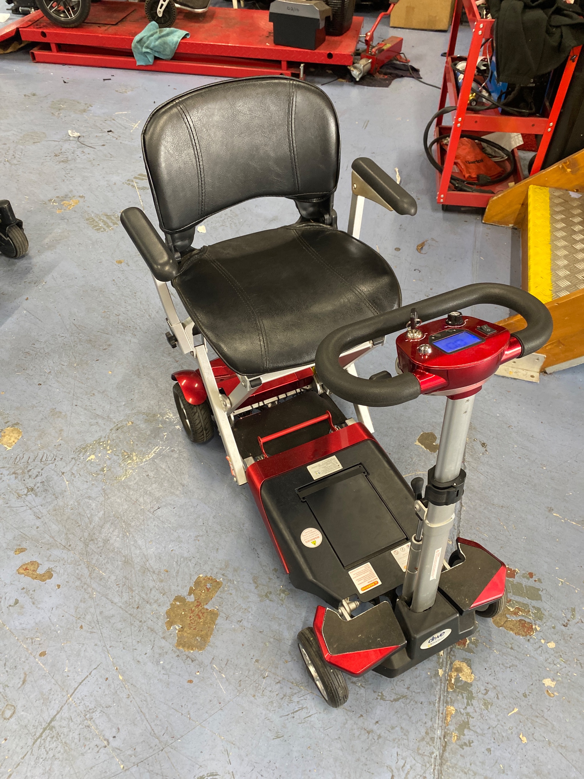 Folding mobility scooter collected for workshop servicing