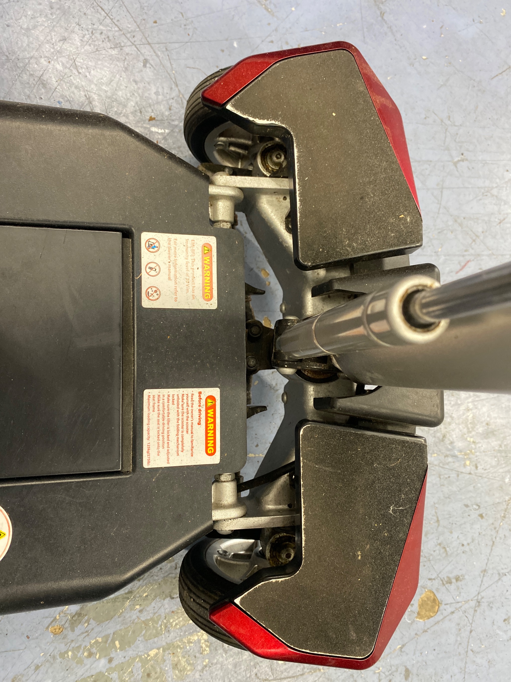 Replacing worn front track rods on a mobility scooter
