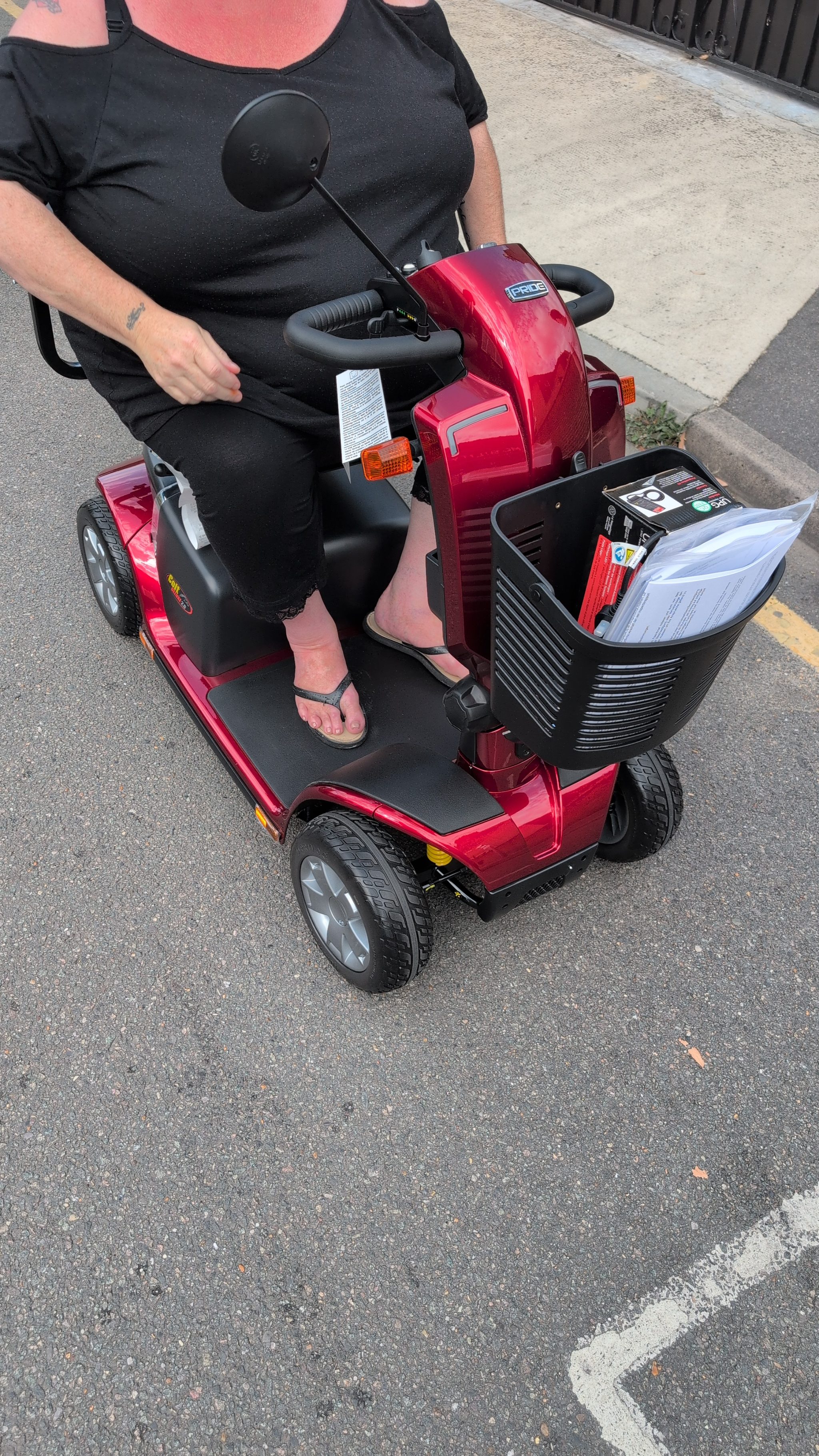 Pride Mobility scooters lined up for customer demonstration