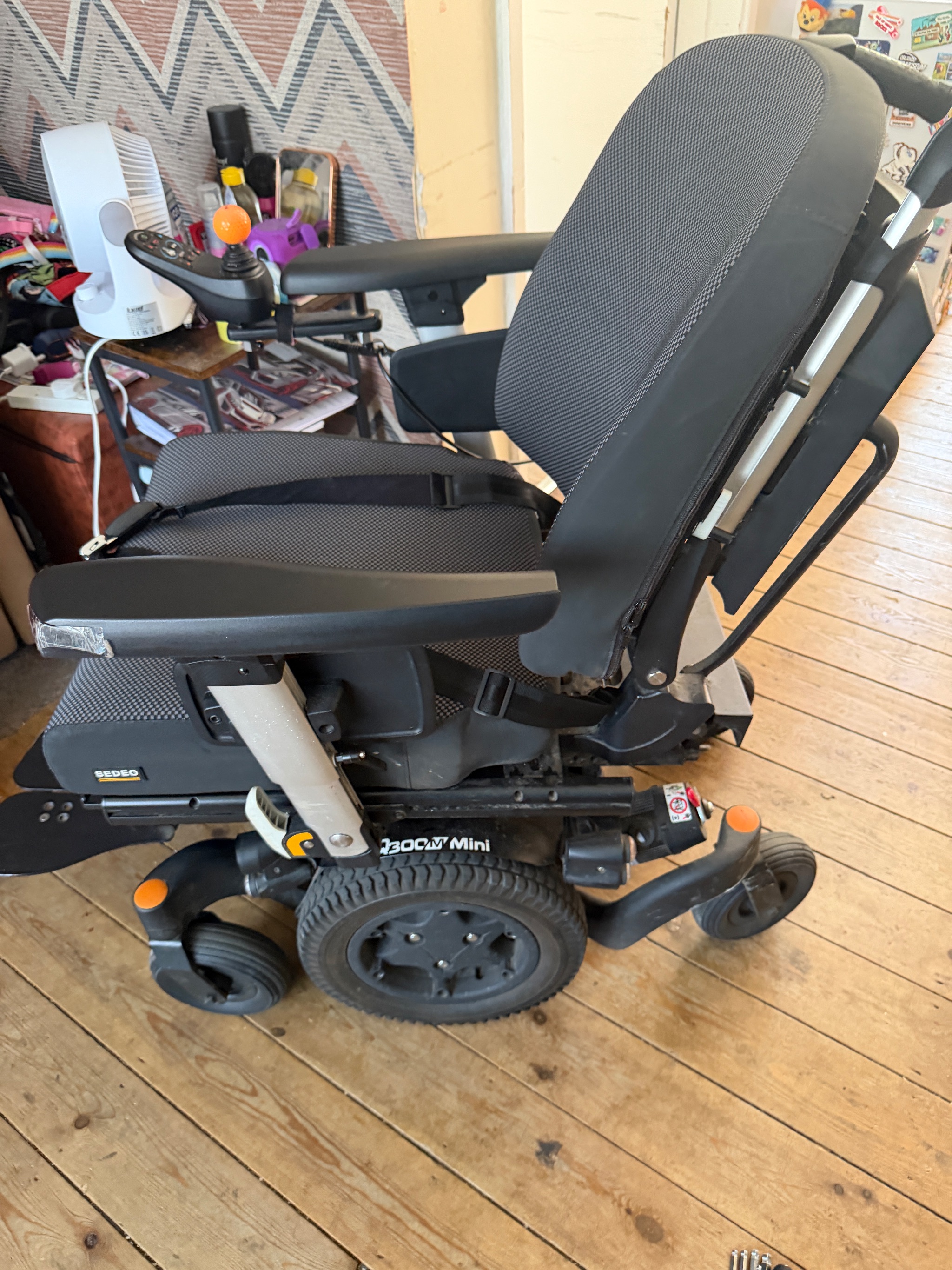 Replacement solenoid brake component installed on powerchair