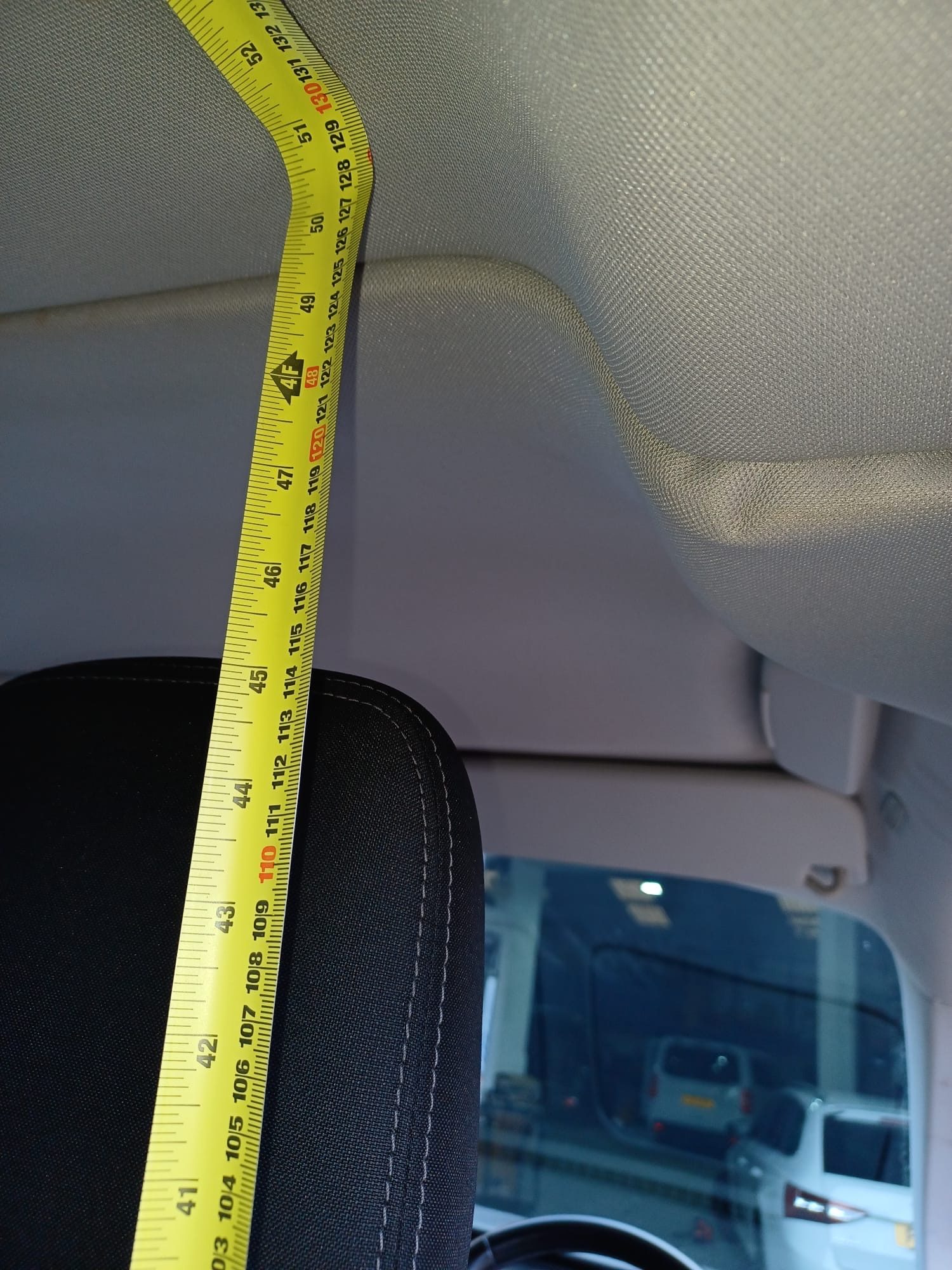 Detail of screen fitting around double front passenger seat