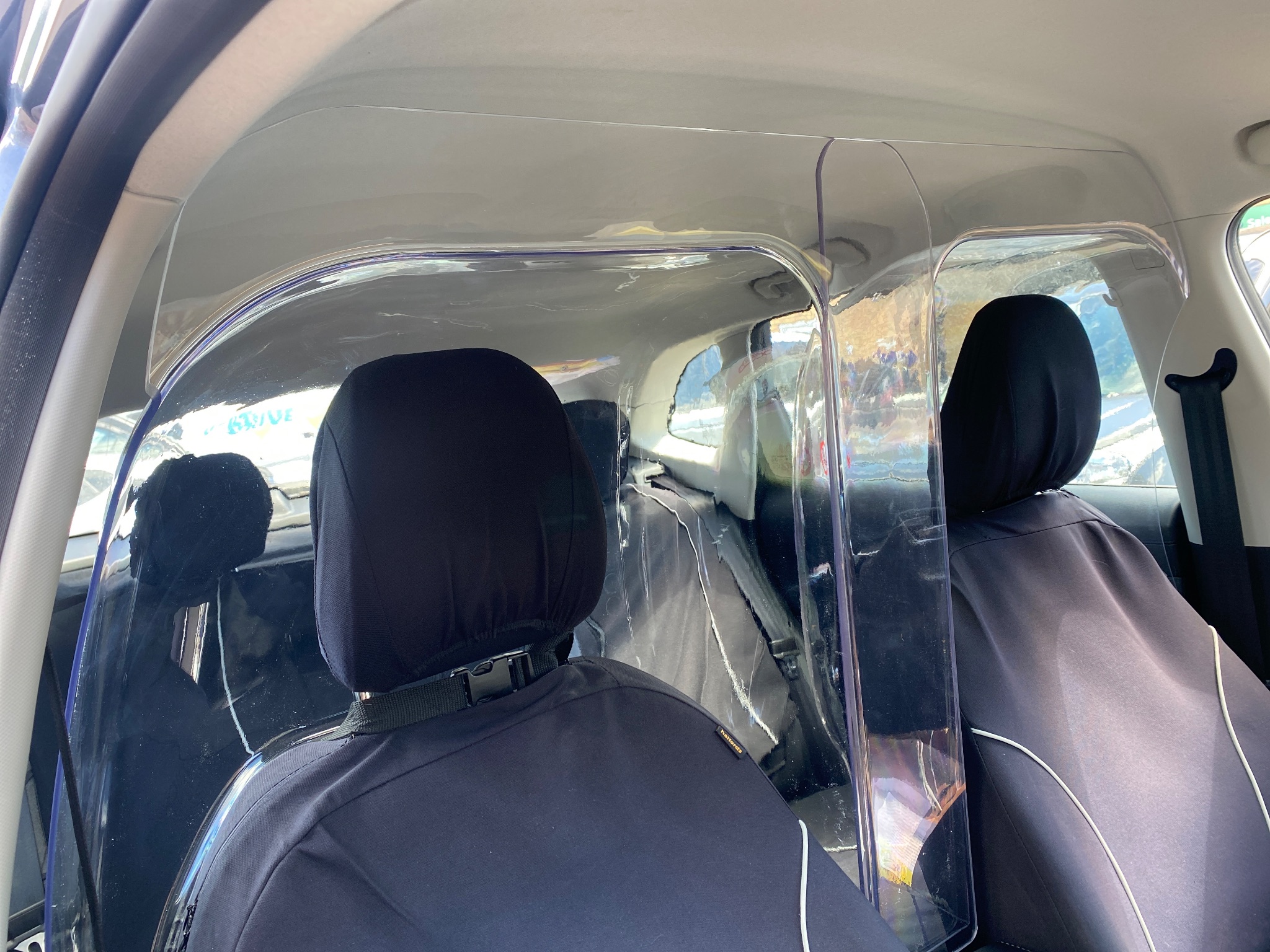 View of the fitted cabin protection screen from the driver seat