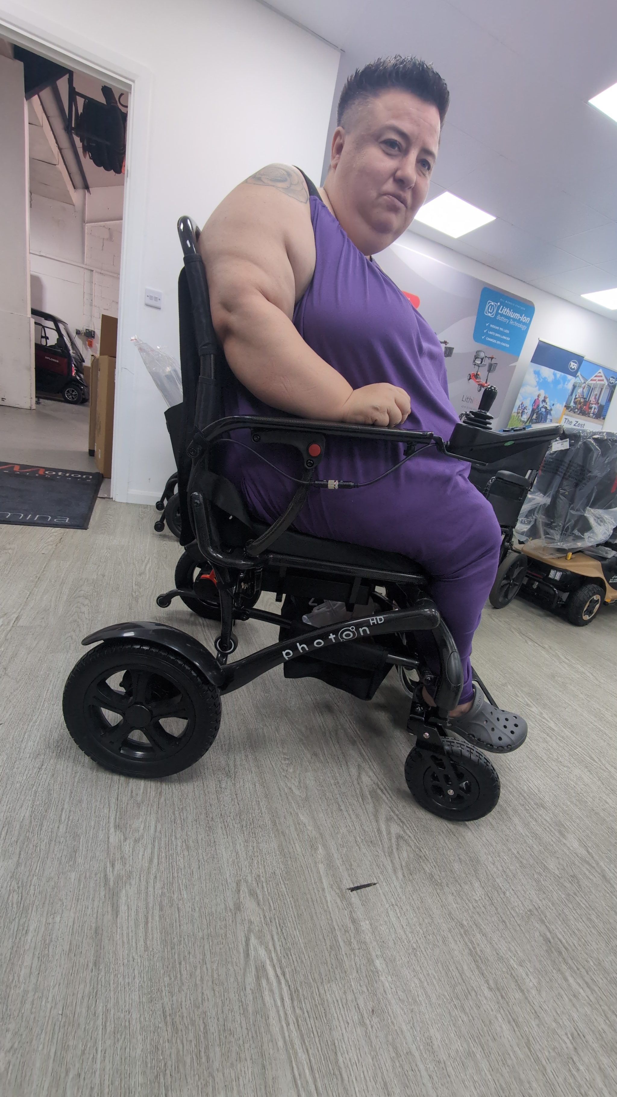 Adjusting footrests on a manual wheelchair during assessment