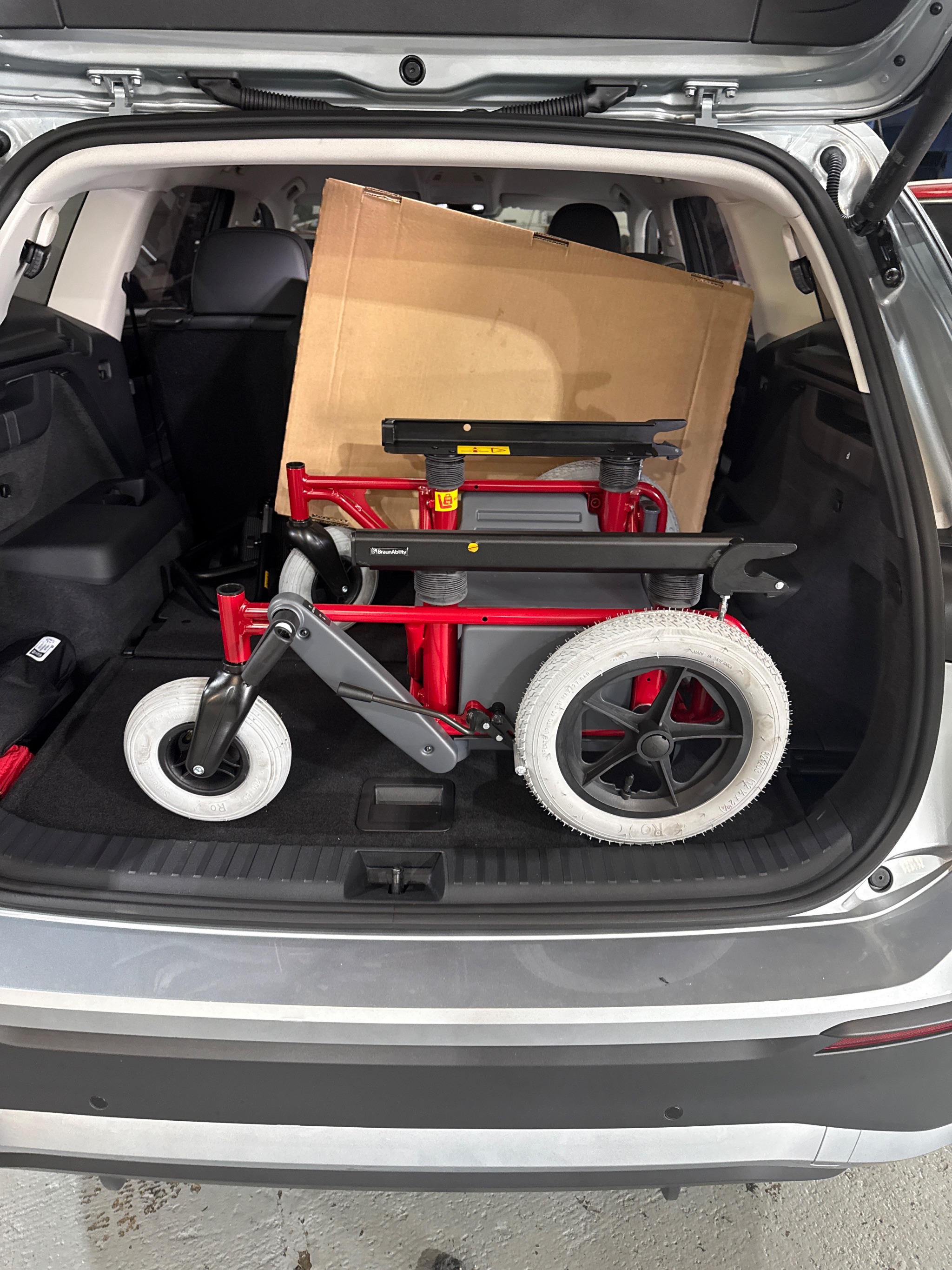 BraunAbility Turny Evo swivel seat rotated outside a Volkswagen Tayron