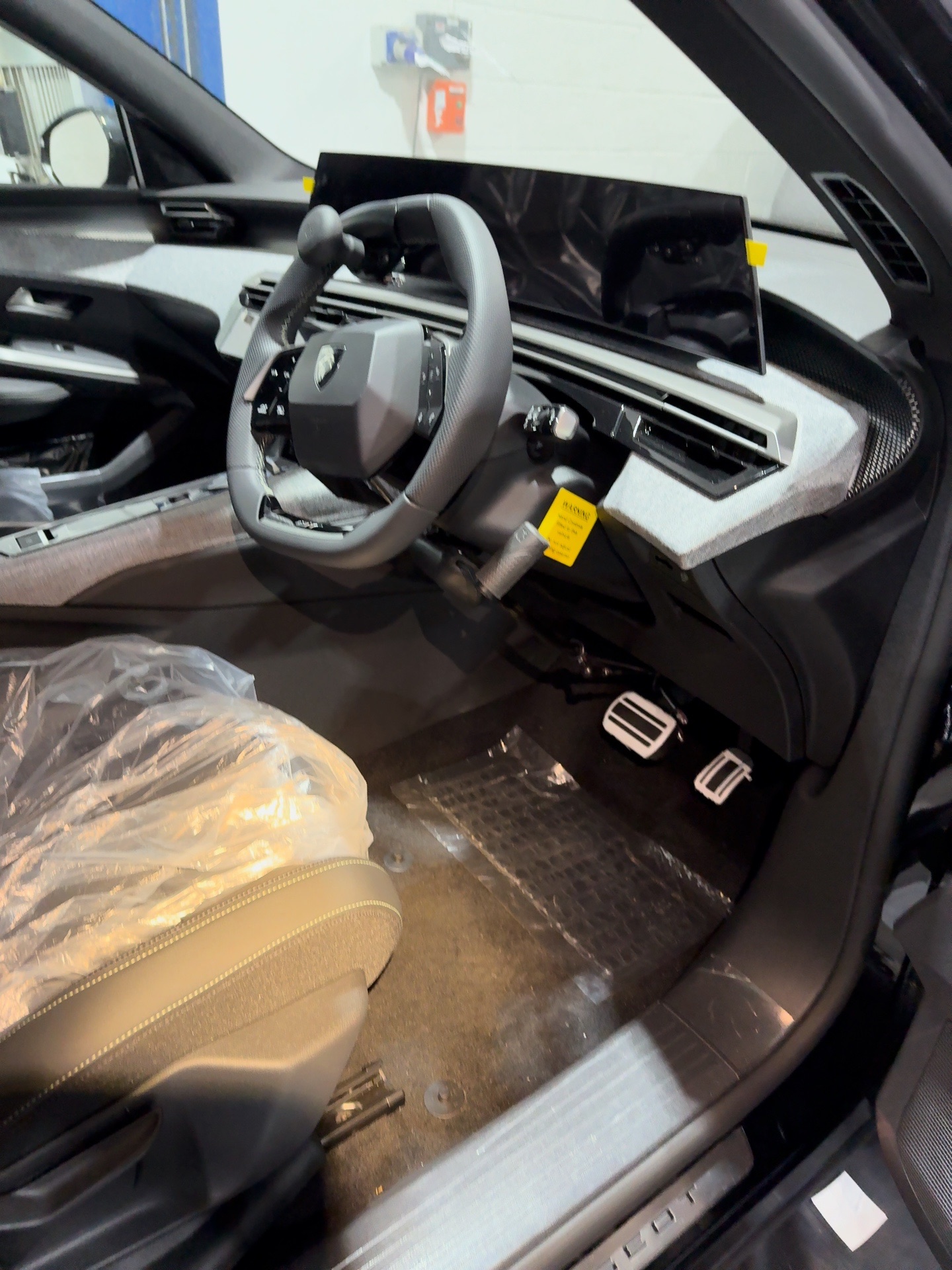 Jeff Gosling push-pull hand controls fitted in a Peugeot 3008 driver footwell and console
