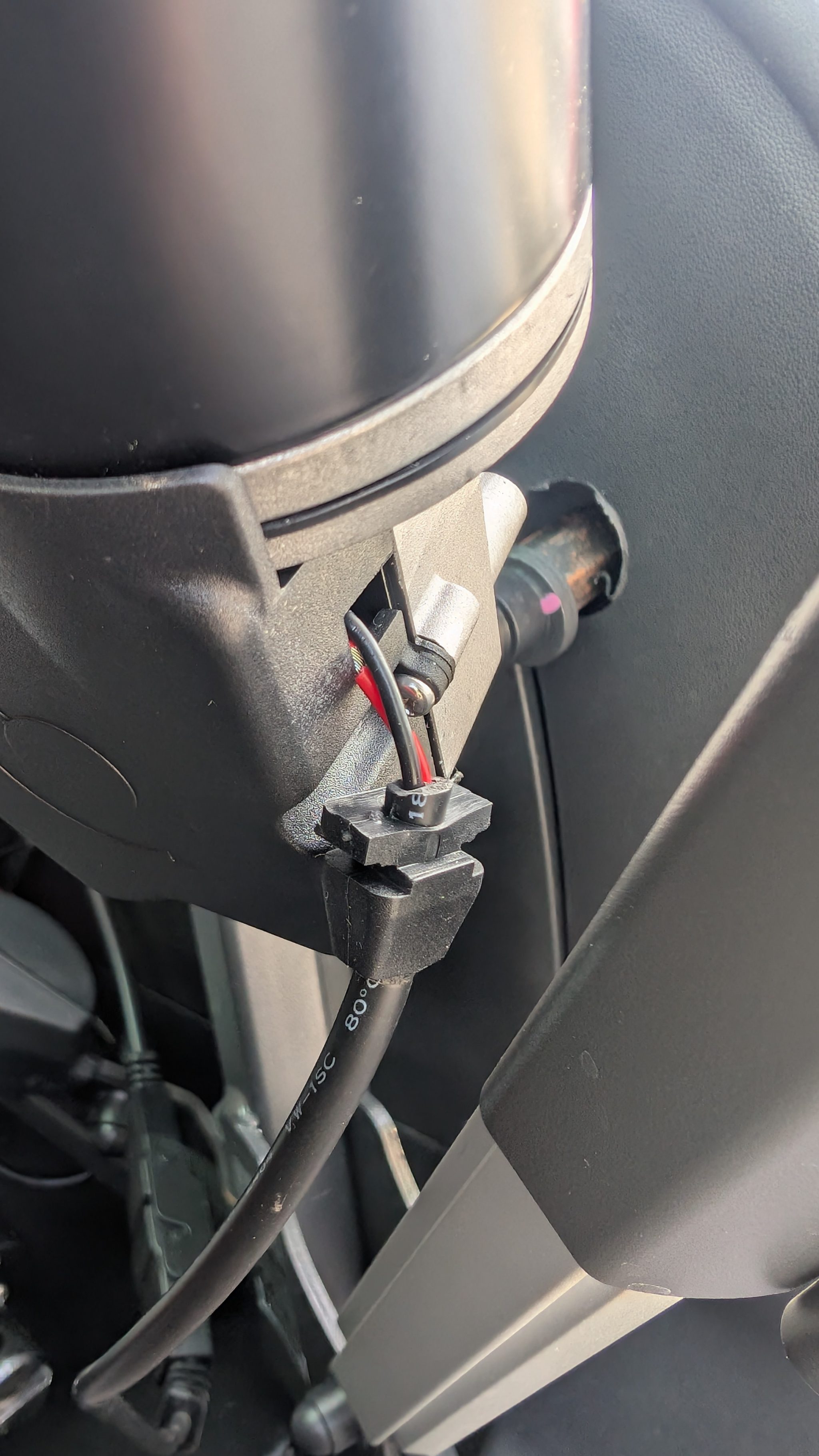 Testing the repaired boot hoist with a mobility device