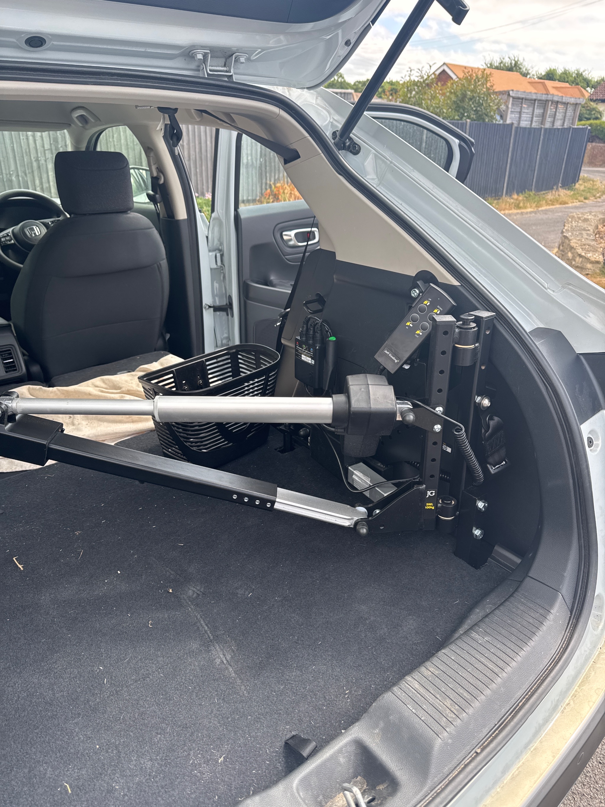 Mobility scooter safely stowed inside the boot of a Honda HR-V