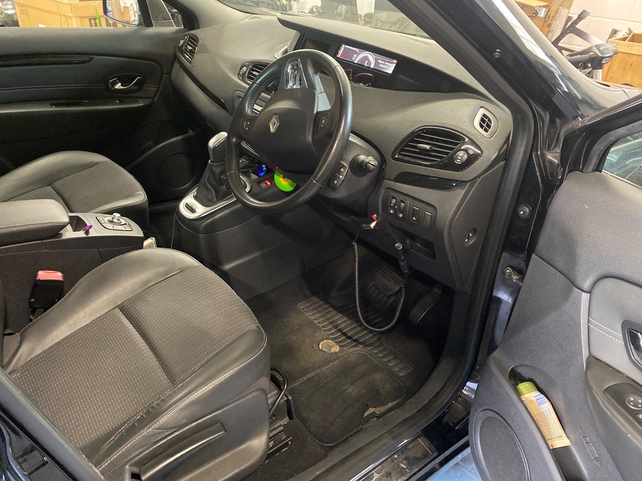 Close up of steering wheel controls and satellite accelerator button