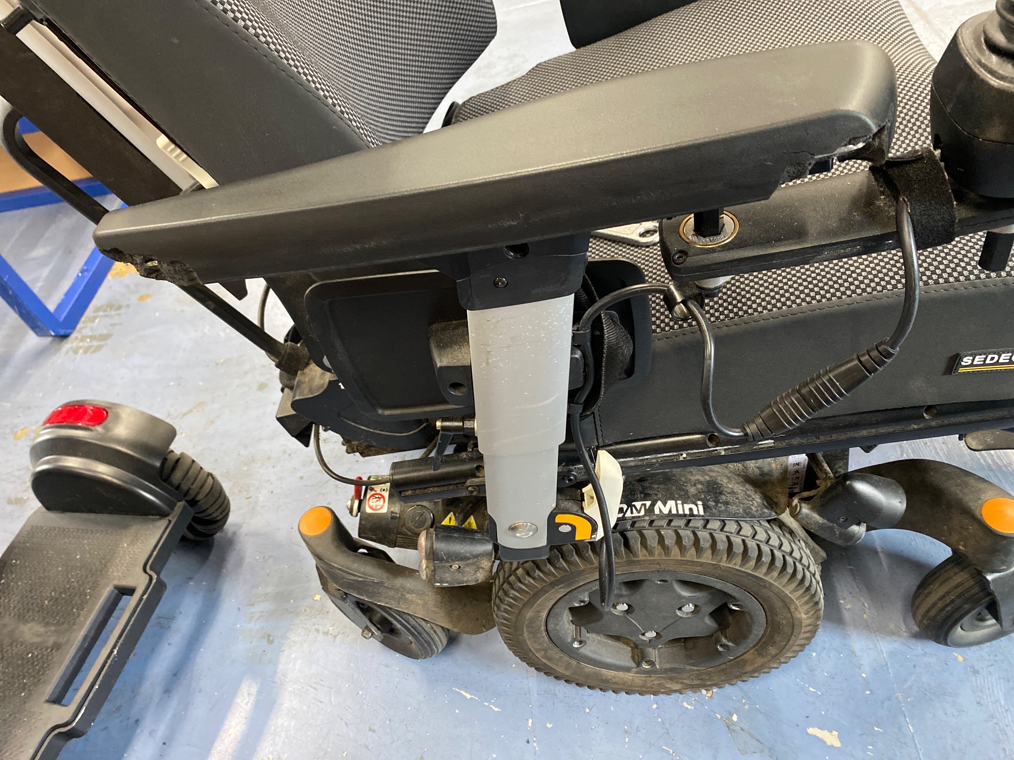 New replacement armpad fitted to a Quickie powerchair