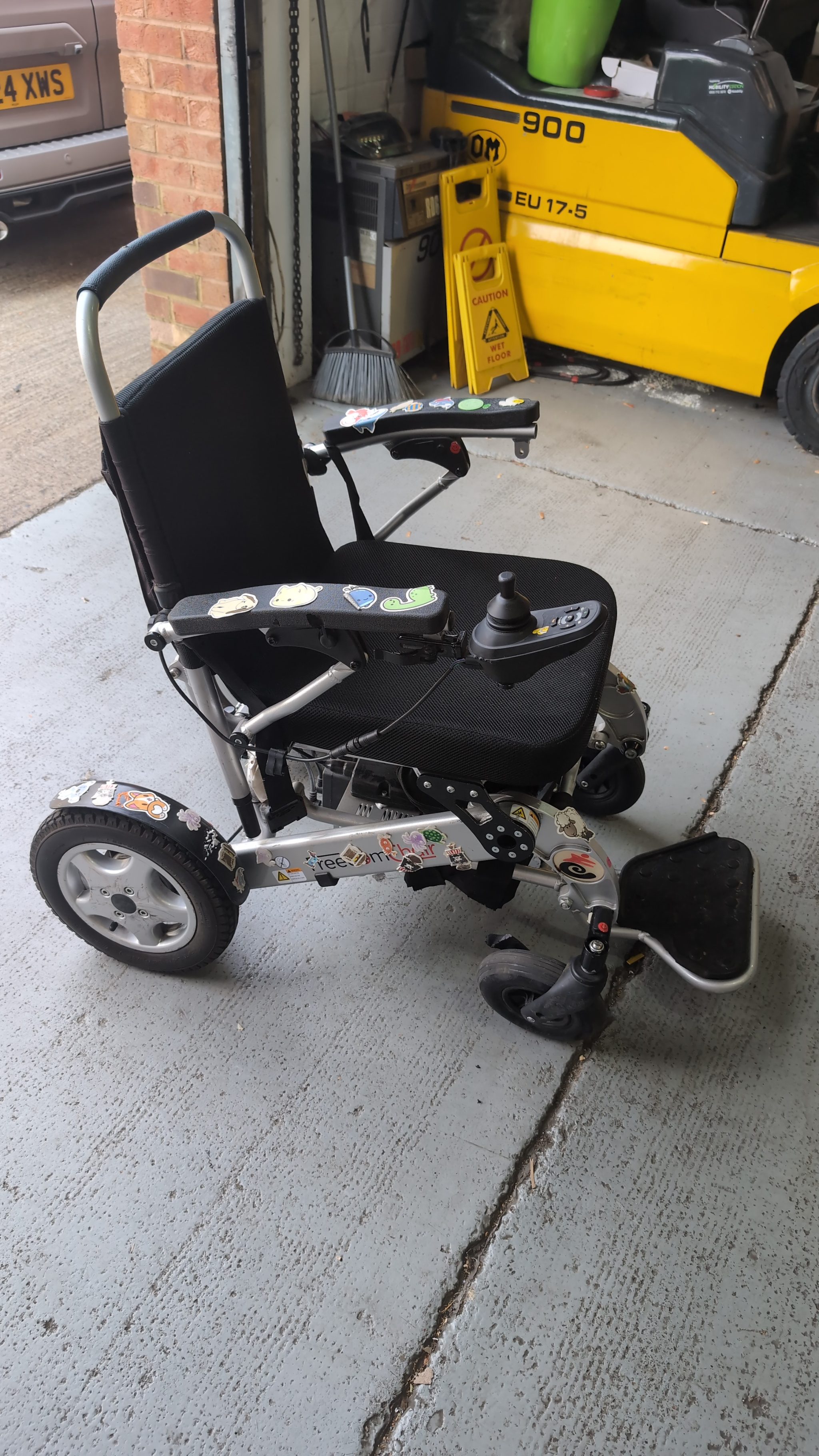 Damaged FreedomChair power wheelchair brought in for repair