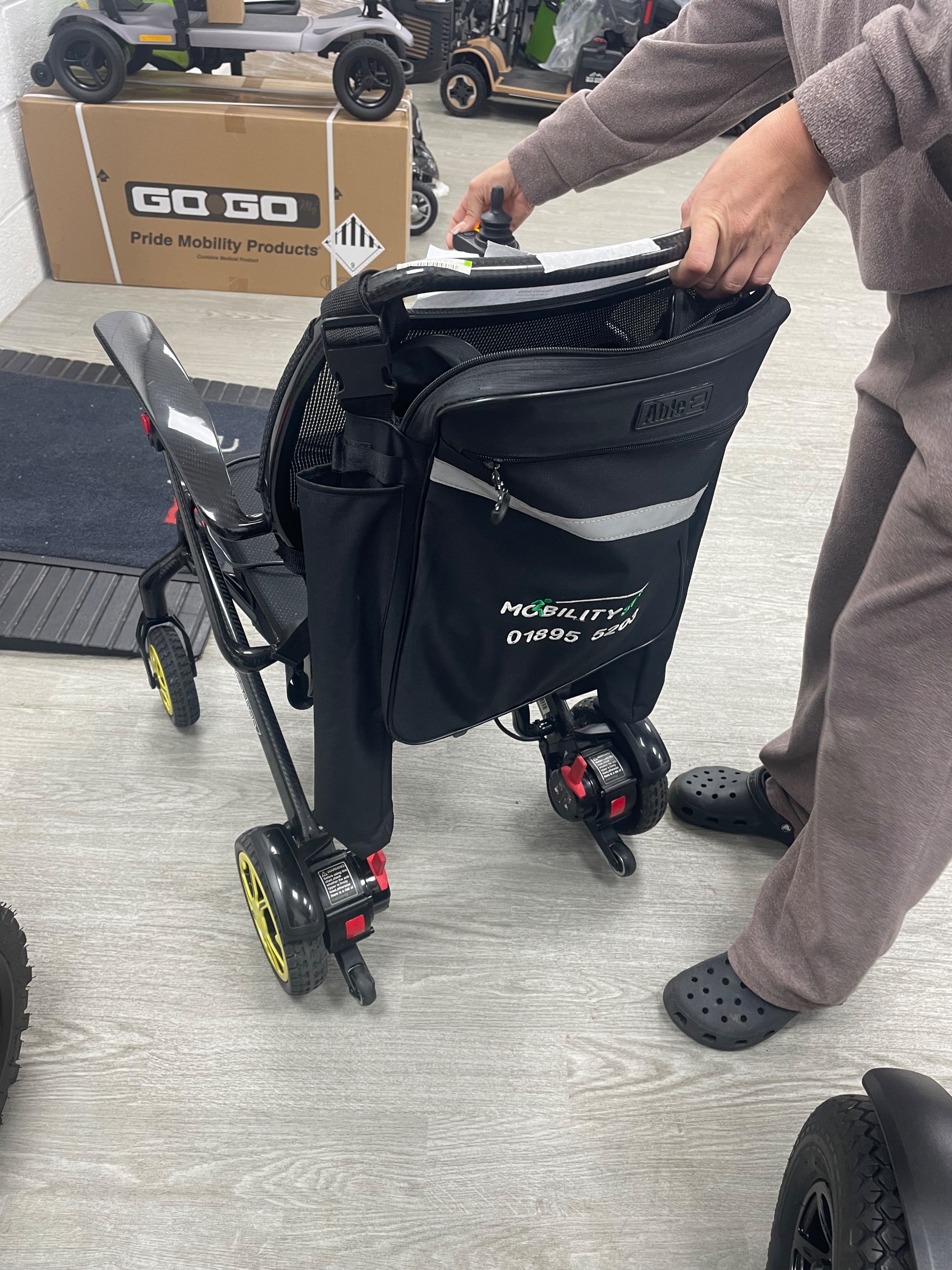Replacement powerchair charger tested and ready for collection