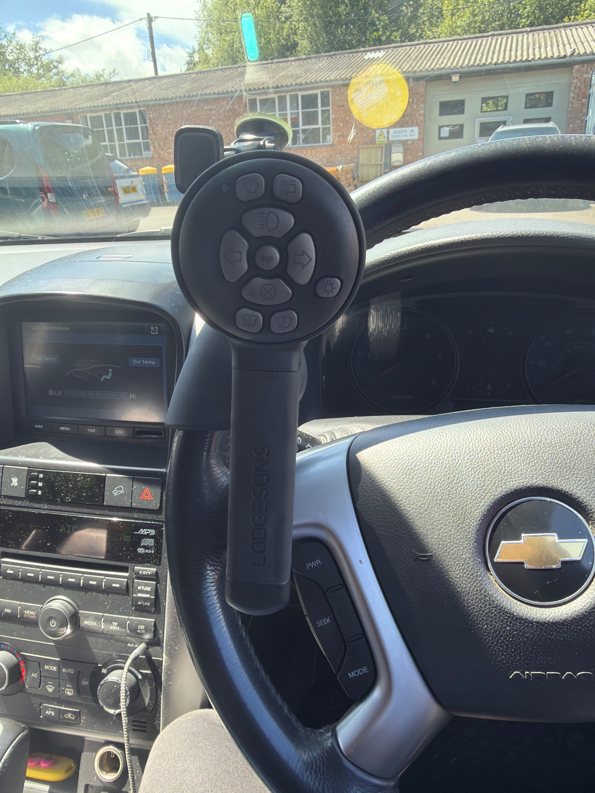 Lodgesons 10-way wireless keypad fitted to steering wheel