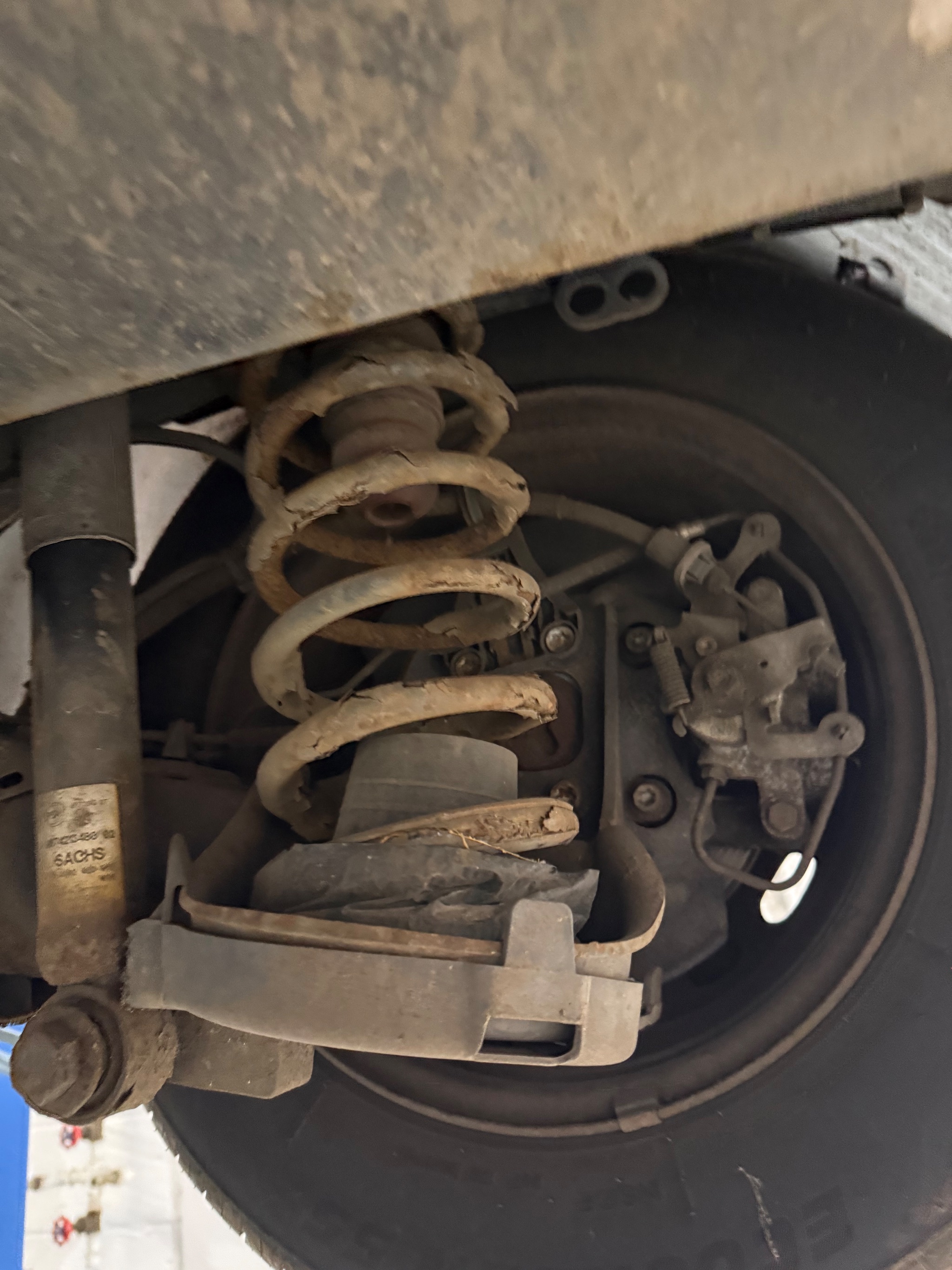 Replacement Allied Mobility exhaust fitted under the lowered floor of a Peugeot Horizon