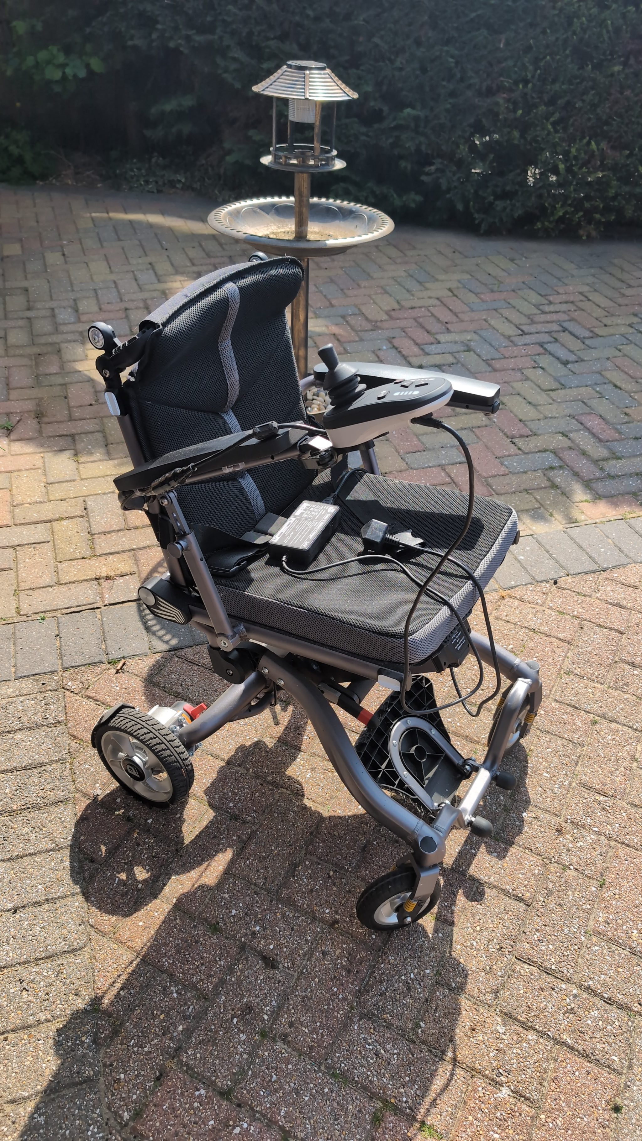 New replacement battery installed in power wheelchair
