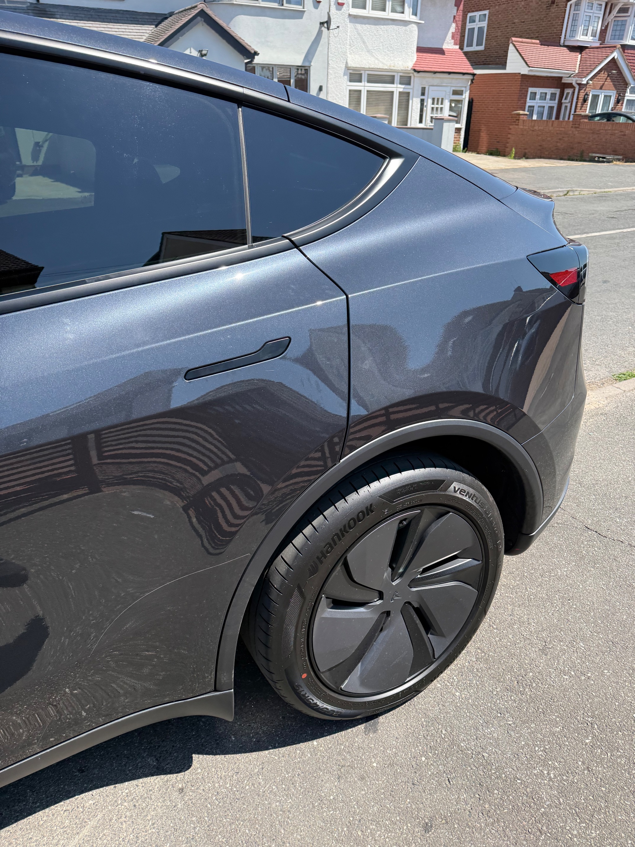 Push-pull hand controls fitted to a Tesla Model Y