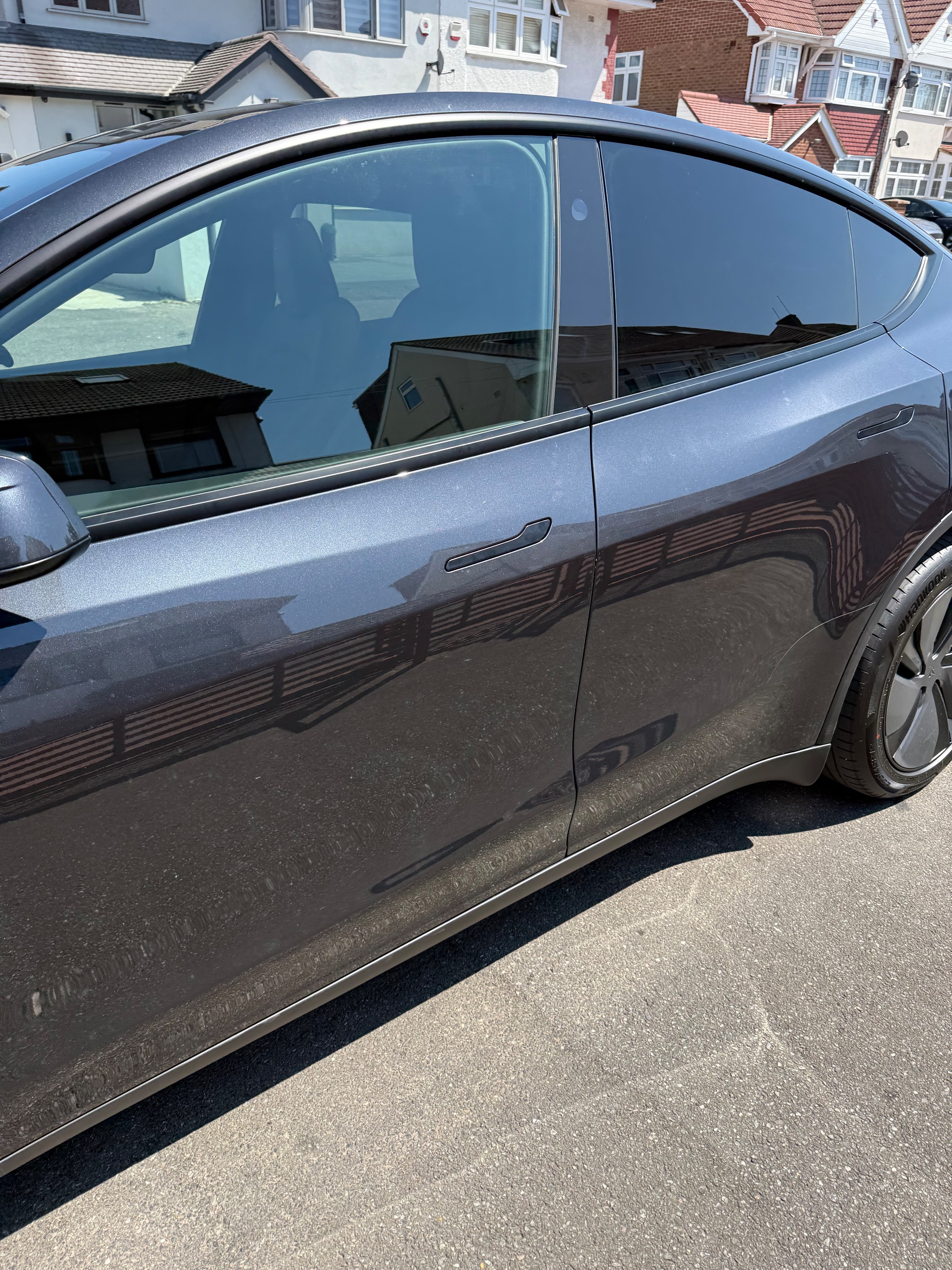 Push-pull hand controls fitted to a Tesla Model Y