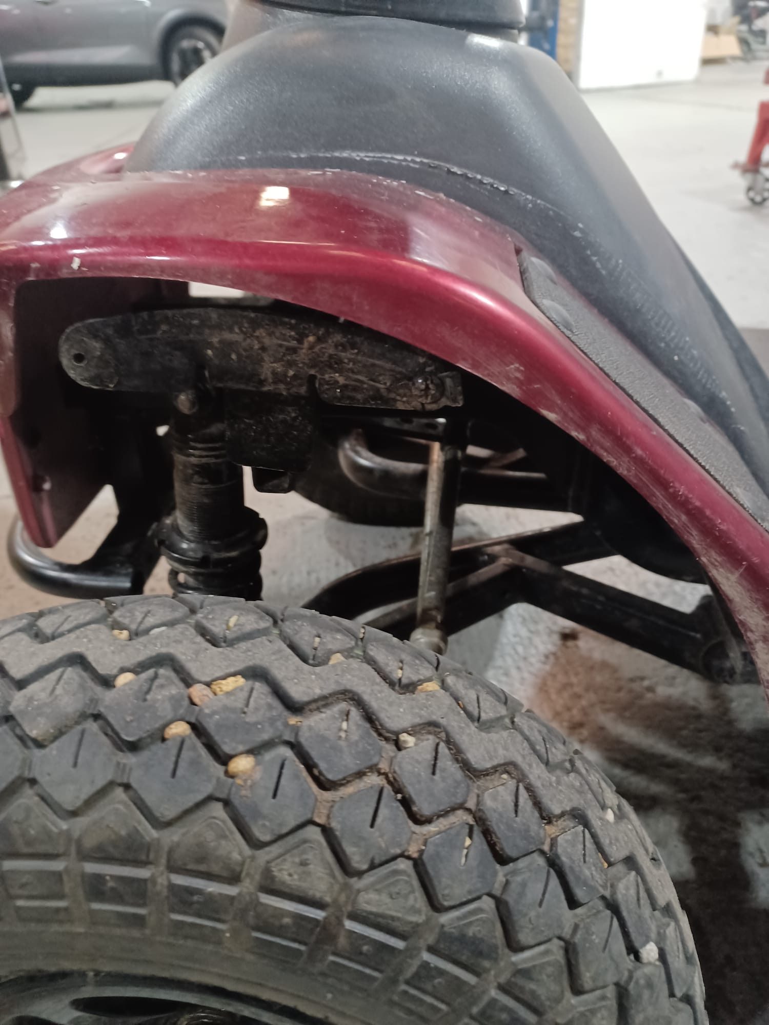 New Tuscan Red body shroud and wheel fenders installed on scooter