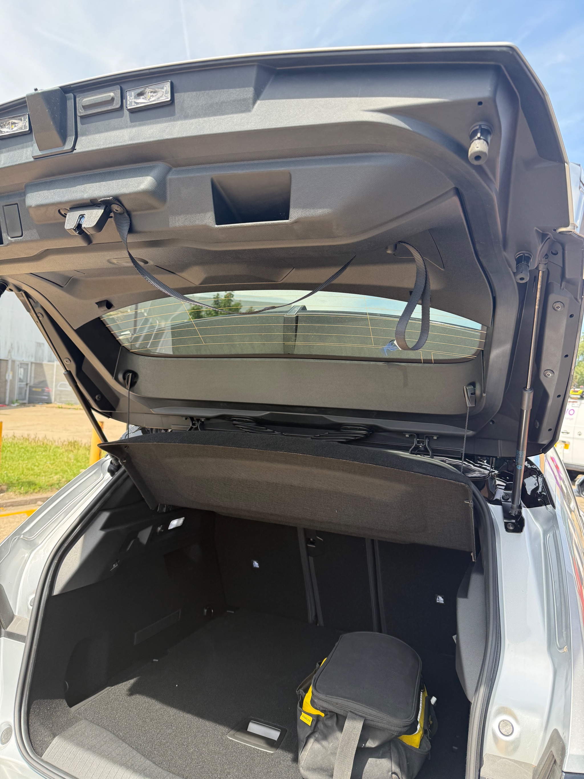 Overview of the driver cabin in a Vauxhall Grandland showing steering adaptations