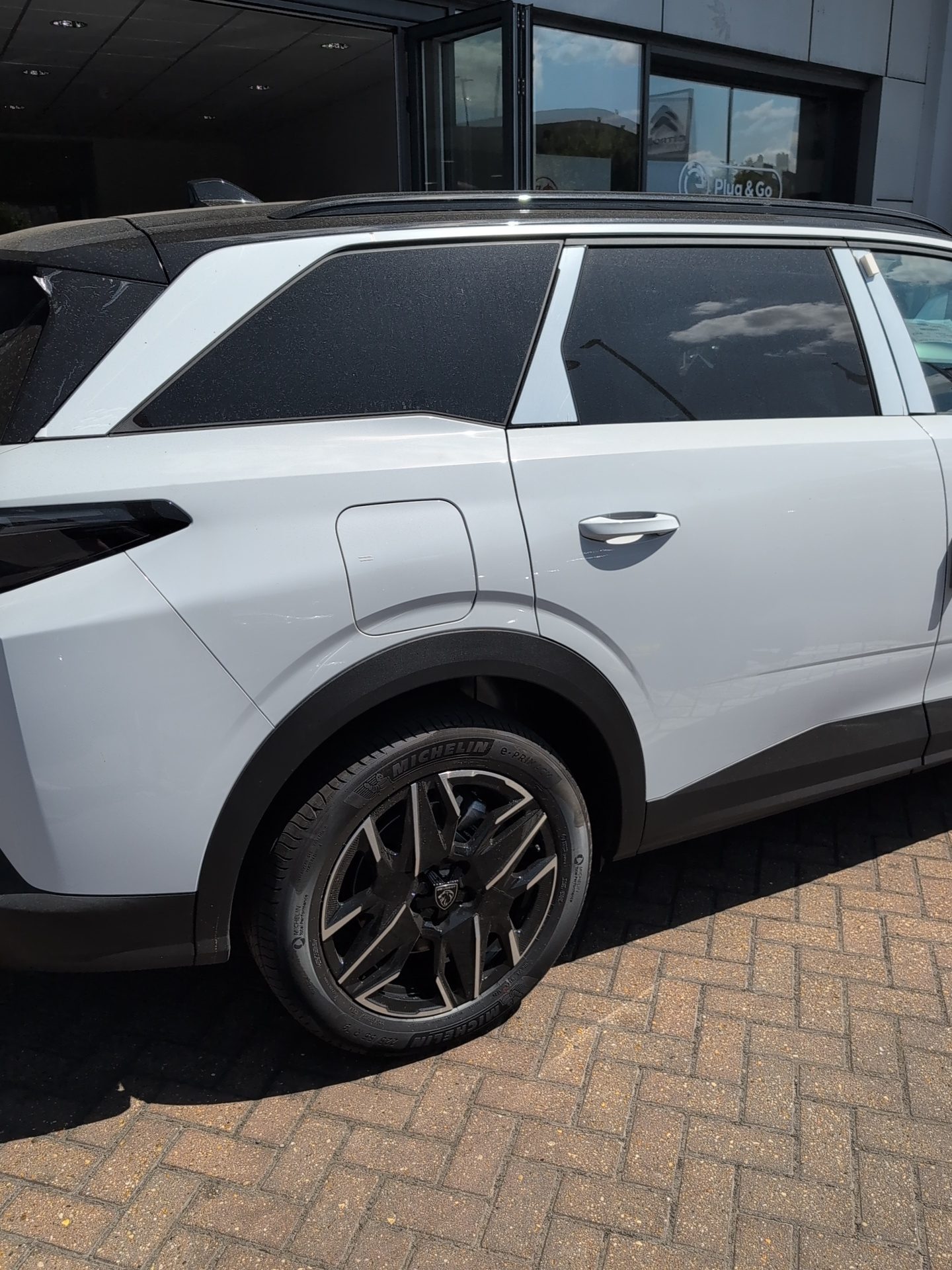 Manual transfer plate fitted to a Peugeot 5008 at Heathrow