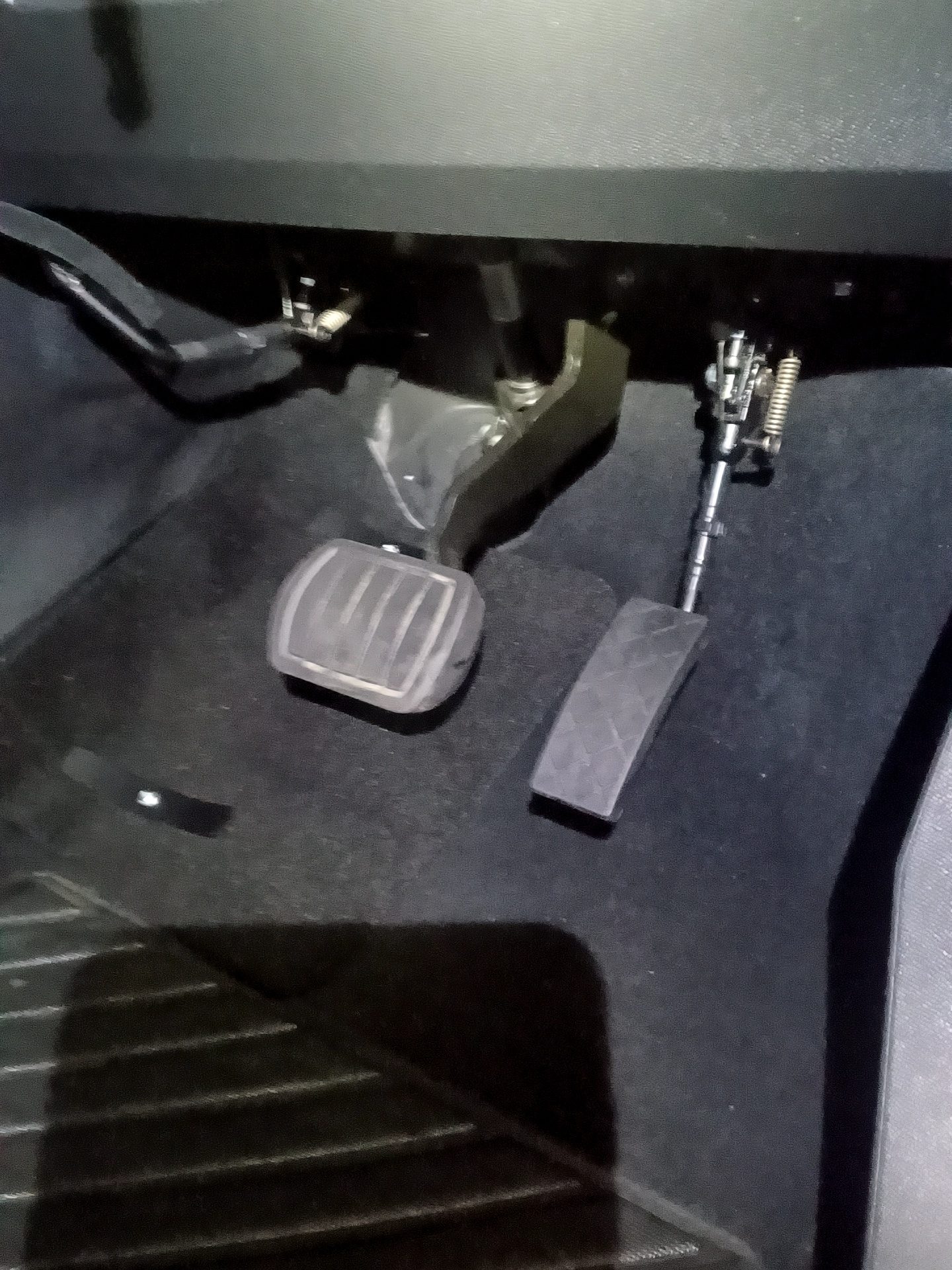 Jeff Gosling twin flip left foot accelerator installed in a Peugeot 3008 footwell