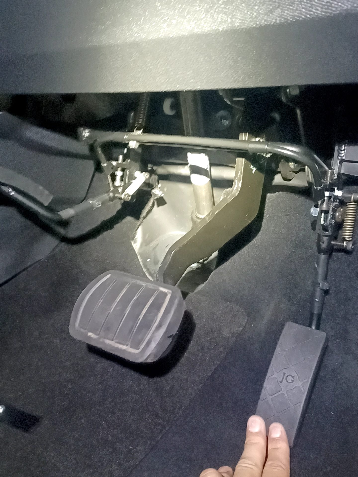 Peugeot 3008 driver footwell showing adapted pedals ready for use