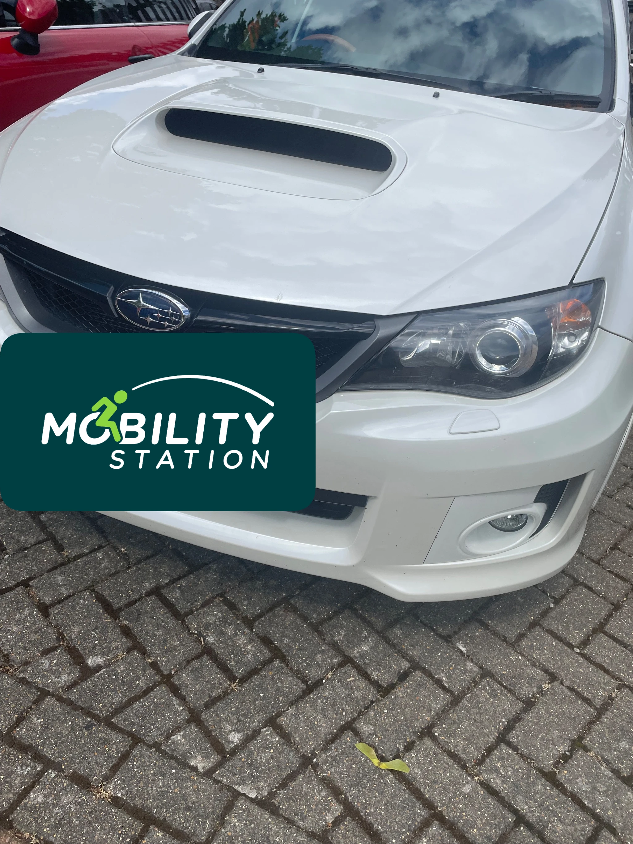 Left footrest removal on a Subaru Impreza WRX