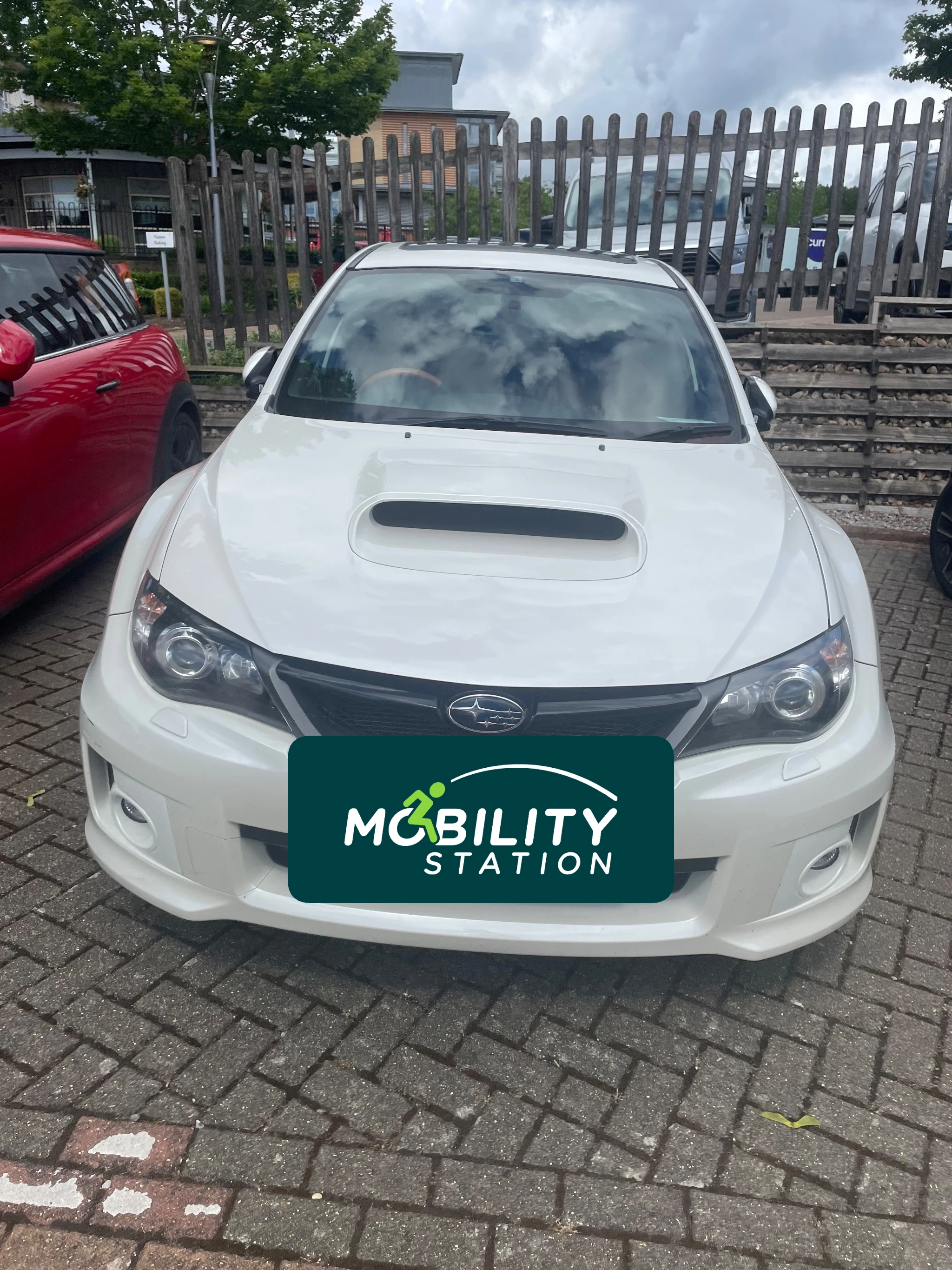 Left footrest removal on a Subaru Impreza WRX